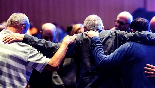 Men praying